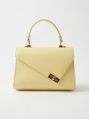 Trapezoid handbag with envelope flap